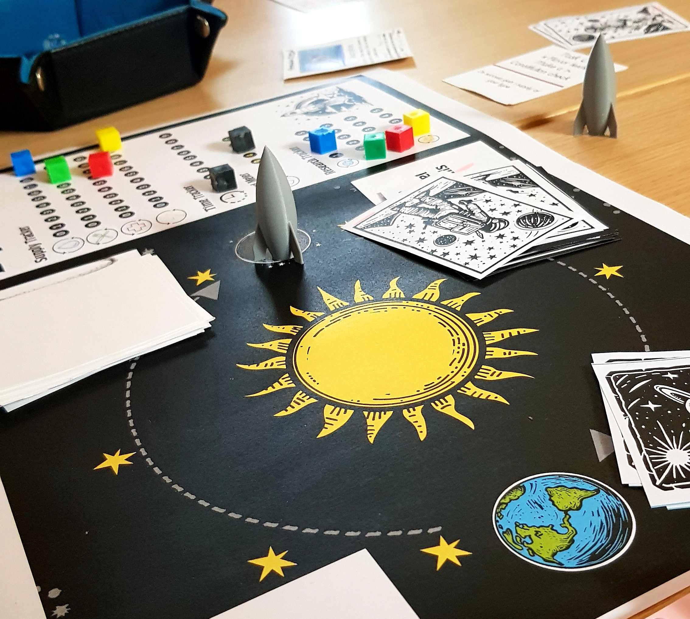 A resources management board game created by students inspired by IdeaSquare Planet